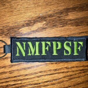 Beautifully stencil font embroidered key chain on black leather NMFPSF